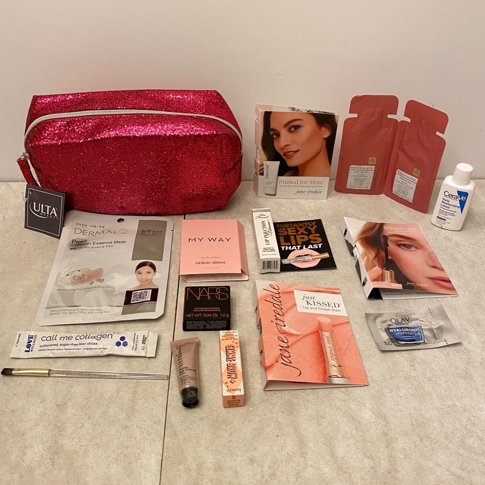 Pink glitzy makeup bag with samples